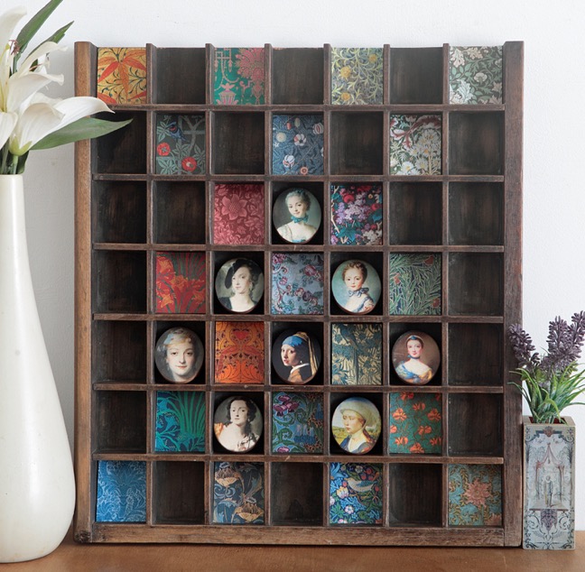 Decorative Wall Art with William Morris Prints and Wooden Oval Portraits in an Antique printers tray type case tray