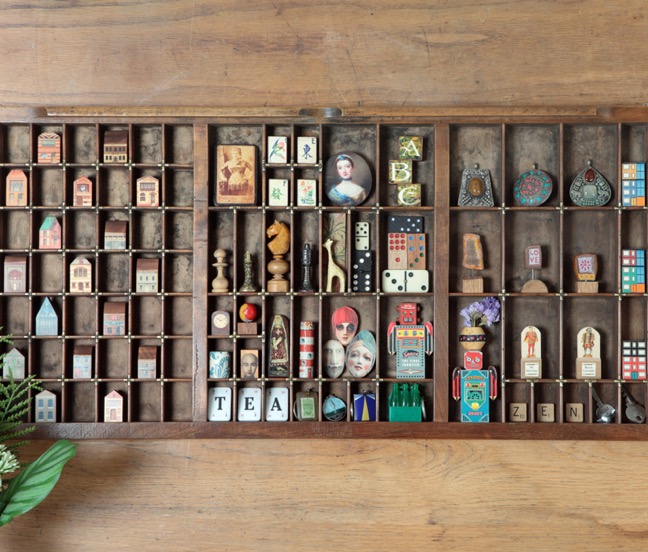 ￼￼Cabinet of curios and little collectables in an old antique letterpress printers tray type case drawer