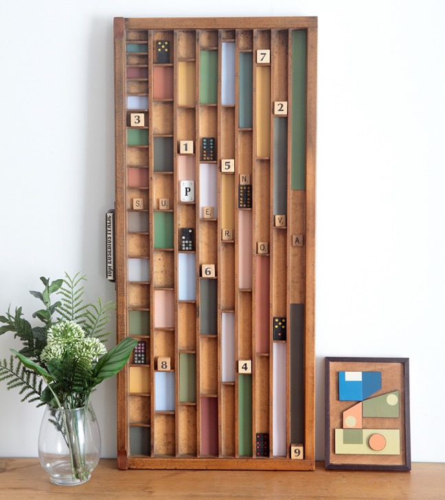 Old Letterpress printers tray used as a display for colourful cards and letters and numbers