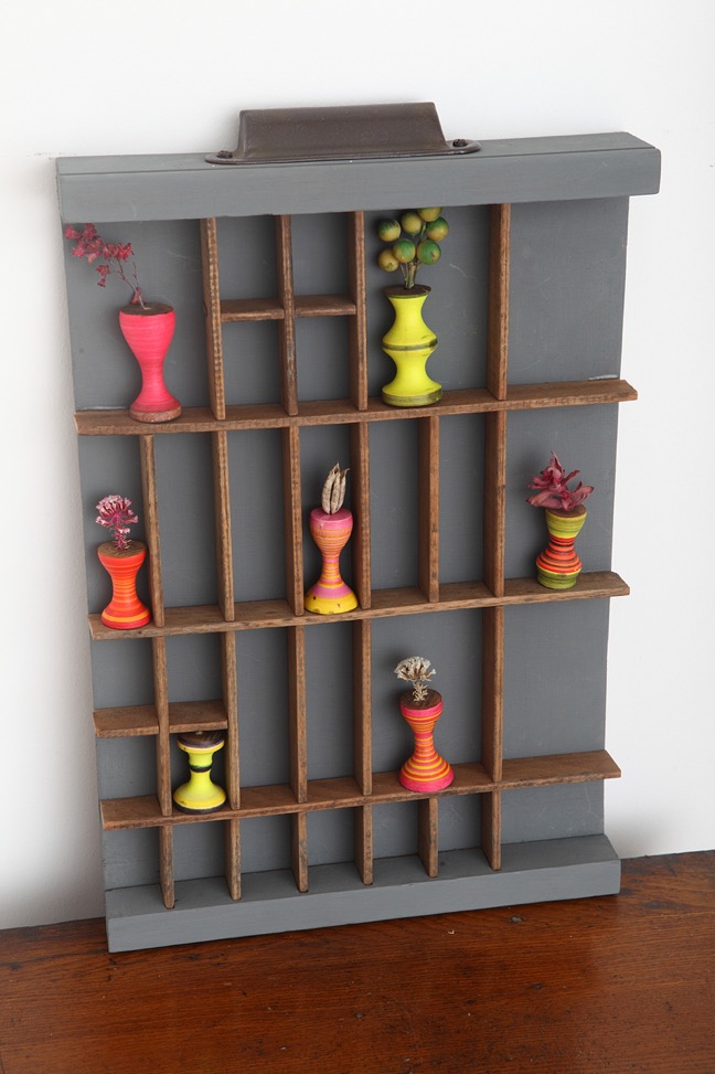 Up cycled old printers type case with colourful hand made little vases