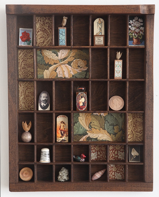 A modern day cabinet of curios in an up cycled printers tray