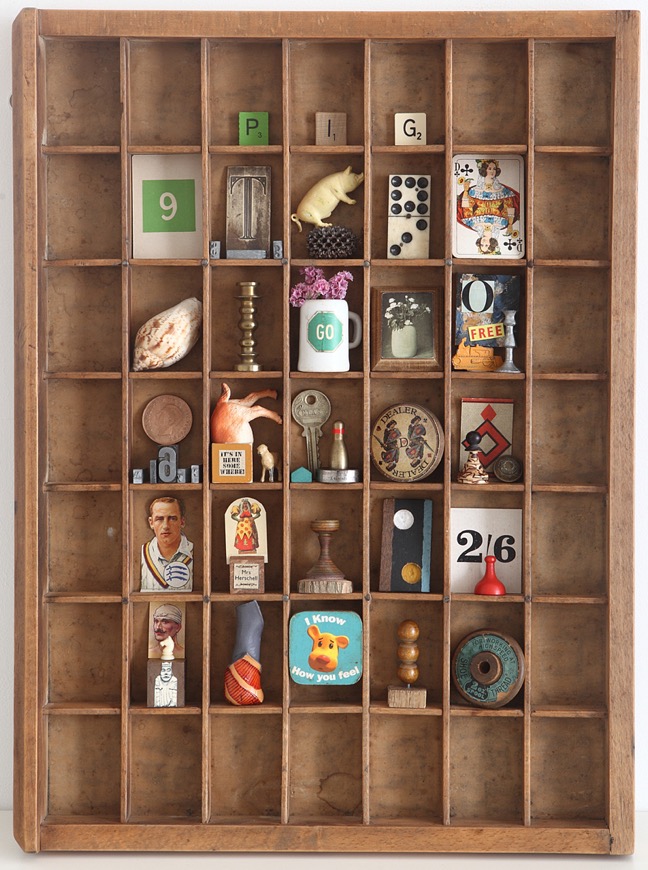 Re purposed letterpress printers type case used as display for eclectic vintage items