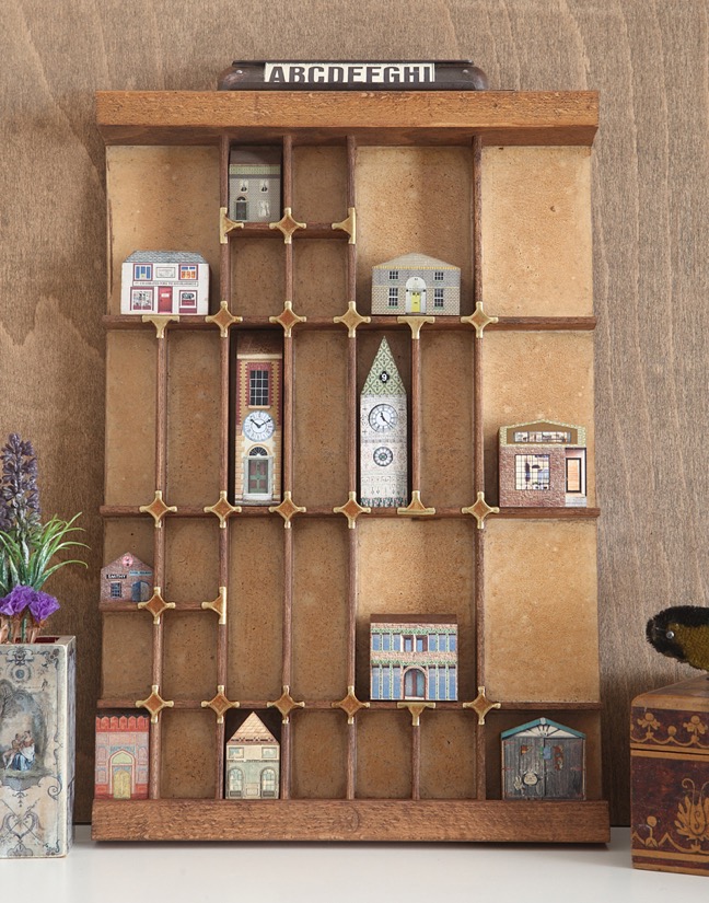 Vintage printers tray re purposed as display for little handmade wooden houses