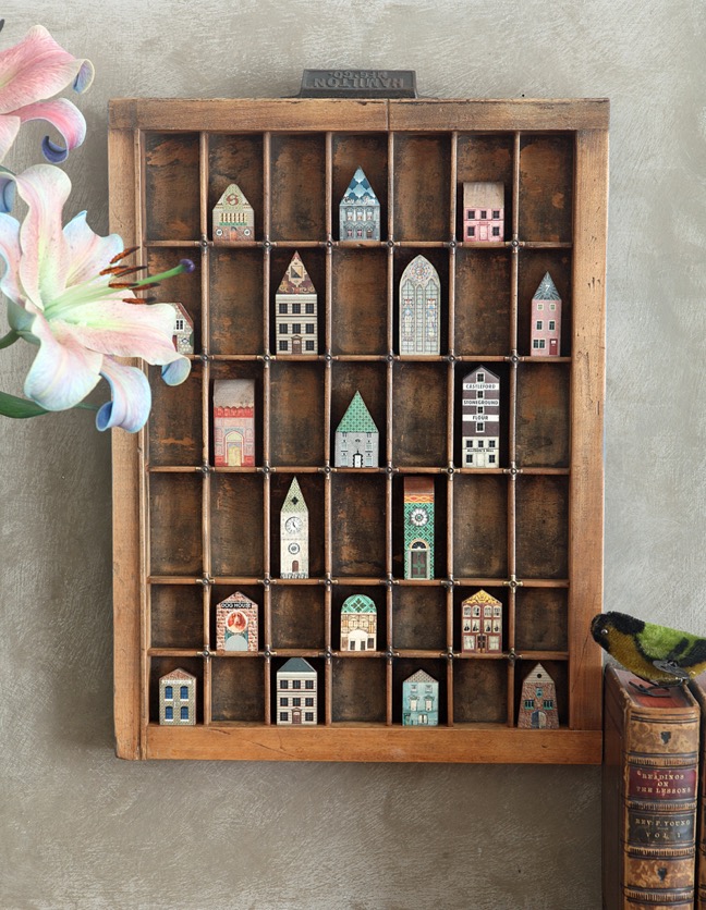 Re purposed vintage Hamilton printers tray used as a display for little quirky handmade houses & buildings