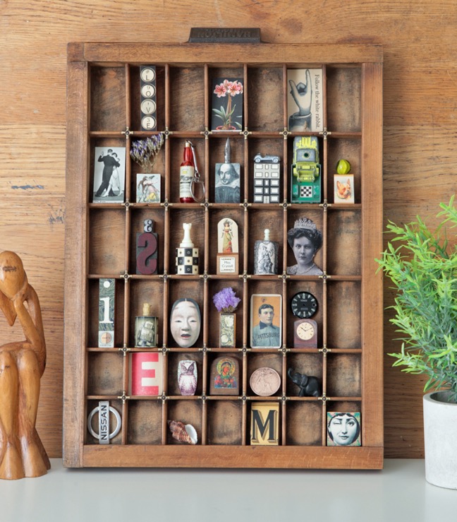 ￼￼Cabinet of curios and little collectables in an old antique letterpress printers tray type case drawer