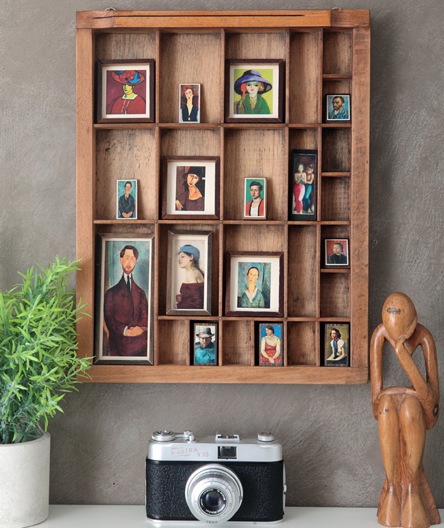 Early 20th Century expressionist portrait paintings in Old Type case cabinet