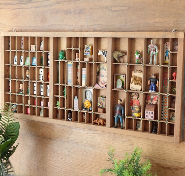 Old Letterpress printers tray used as a display for little quirky items and collectables