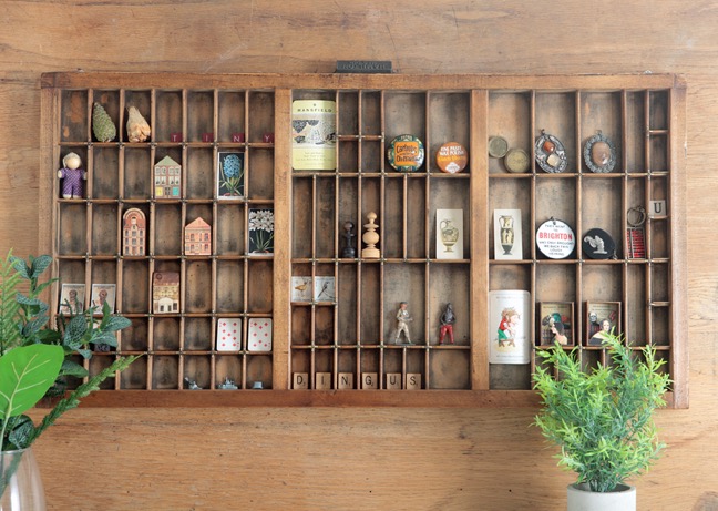 Old Letterpress printers tray used as a display for little quirky items and collectables