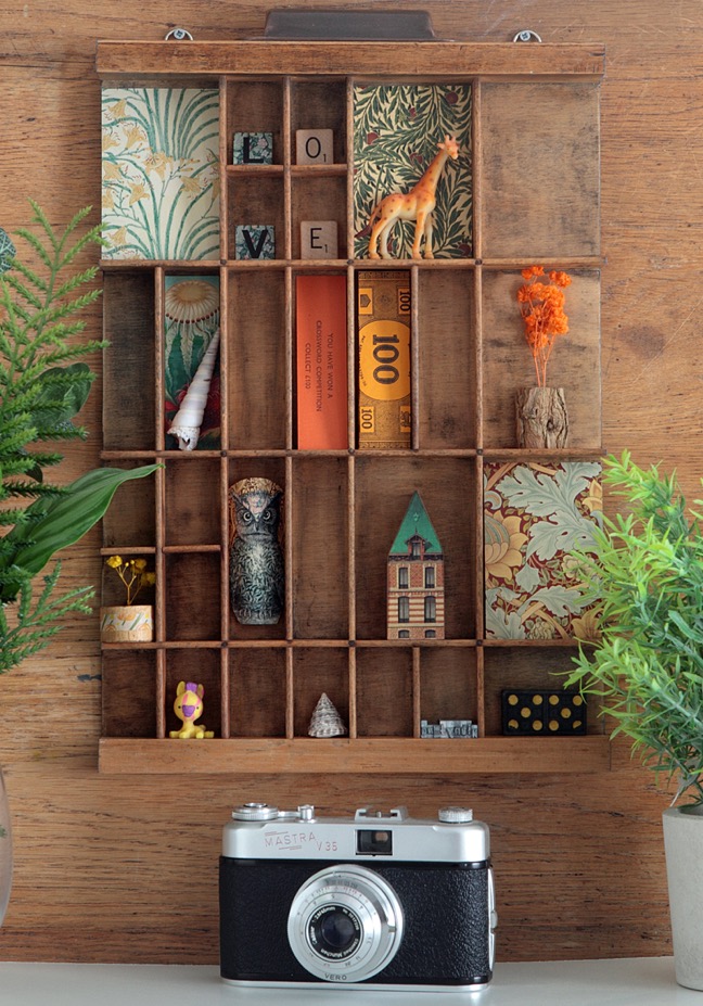 Old Letterpress printers tray used as a display for little quirky items and collectables