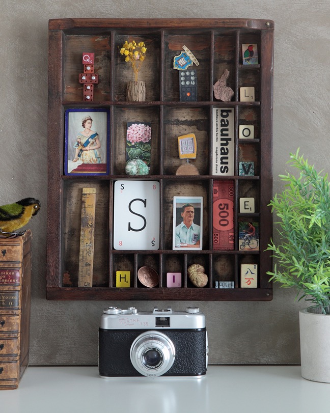 Old Letterpress printers tray used as a display for little quirky items and collectables