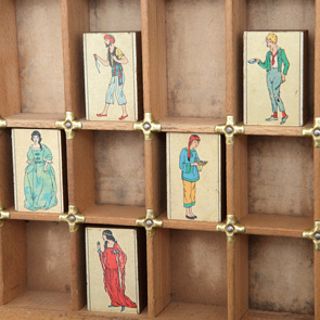 wooden printers tray artwork detail close up curios 