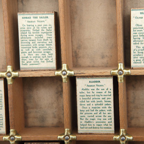 wooden printers tray artwork detail close up curios 