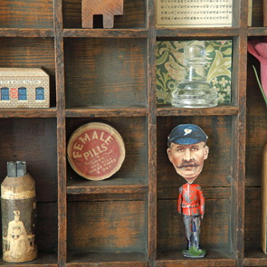 wooden printers tray artwork detail close up curios 